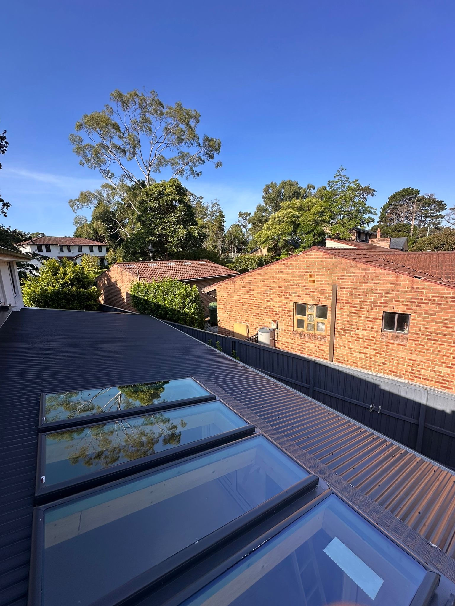 Charcoal Colorbond roof with skylights